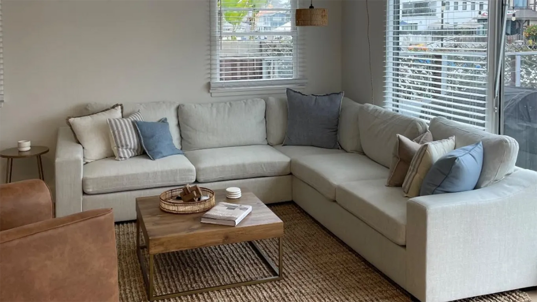 modern apartment living room with L shaped cove sofa