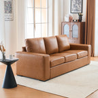 ABCASA Alba brown faux leather sofa in a living room with a cabinet and decor items.