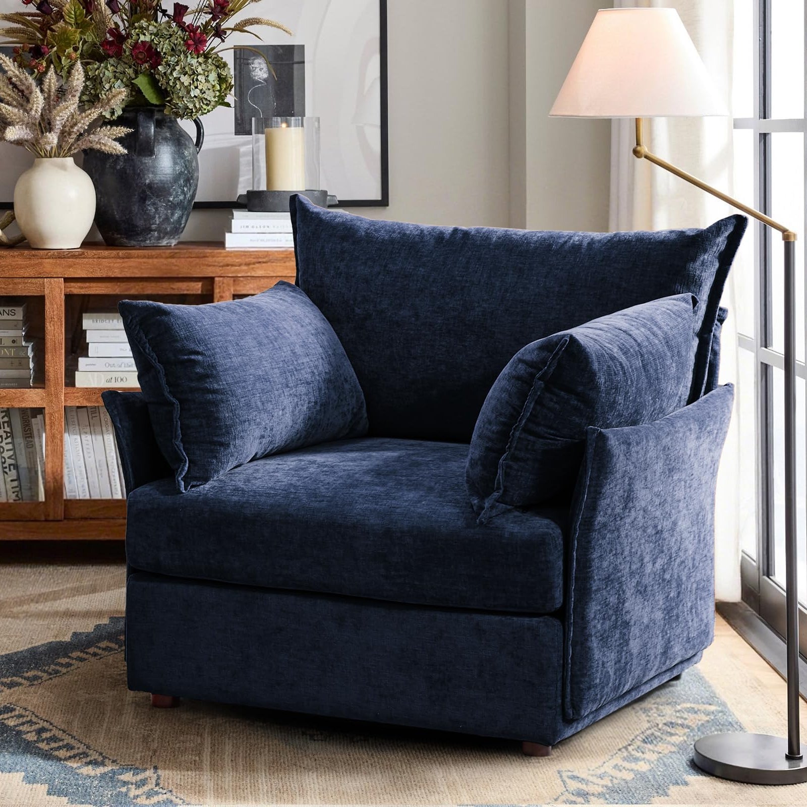 ABCASA Huddle navy blue accent chair in a reading nook.