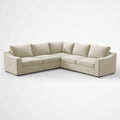 Angled perspective of the ABCASA Cove L-shaped sectional in Pebble Beige fabric.