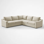 Angled perspective of the ABCASA Cove L-shaped sectional in Pebble Beige fabric.