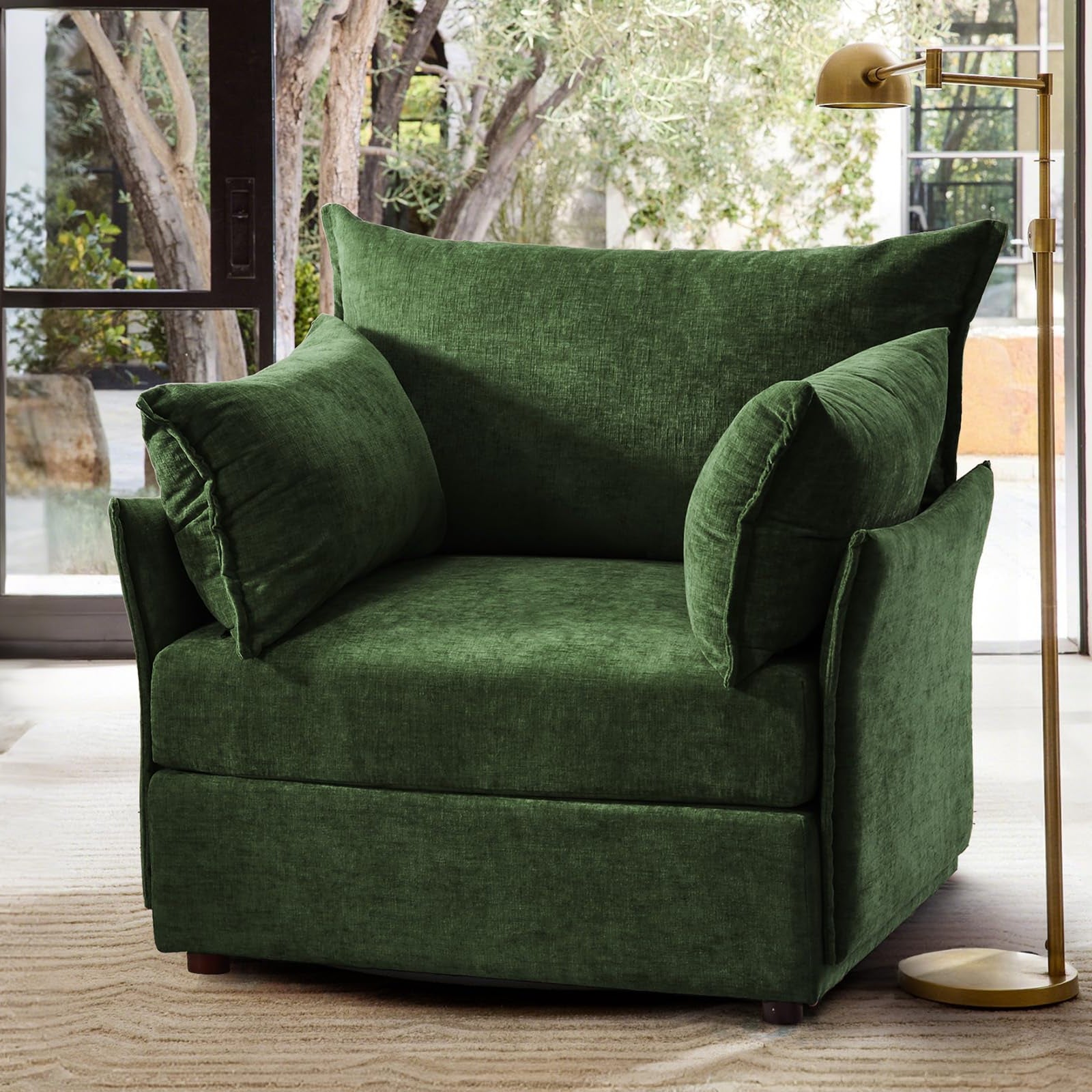 A modern apartment nook styled with the ABCASA Huddle green chair.