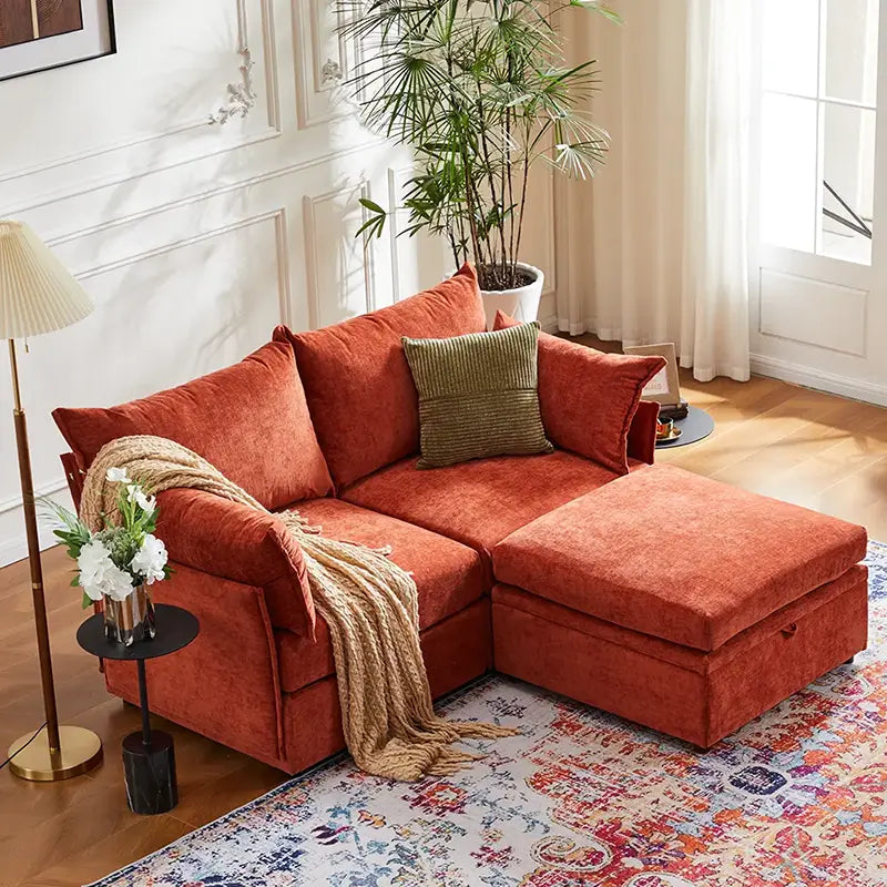 Modern apartment living room styled with the ABCASA Huddle terracotta storage loveseat with an ottoman.
