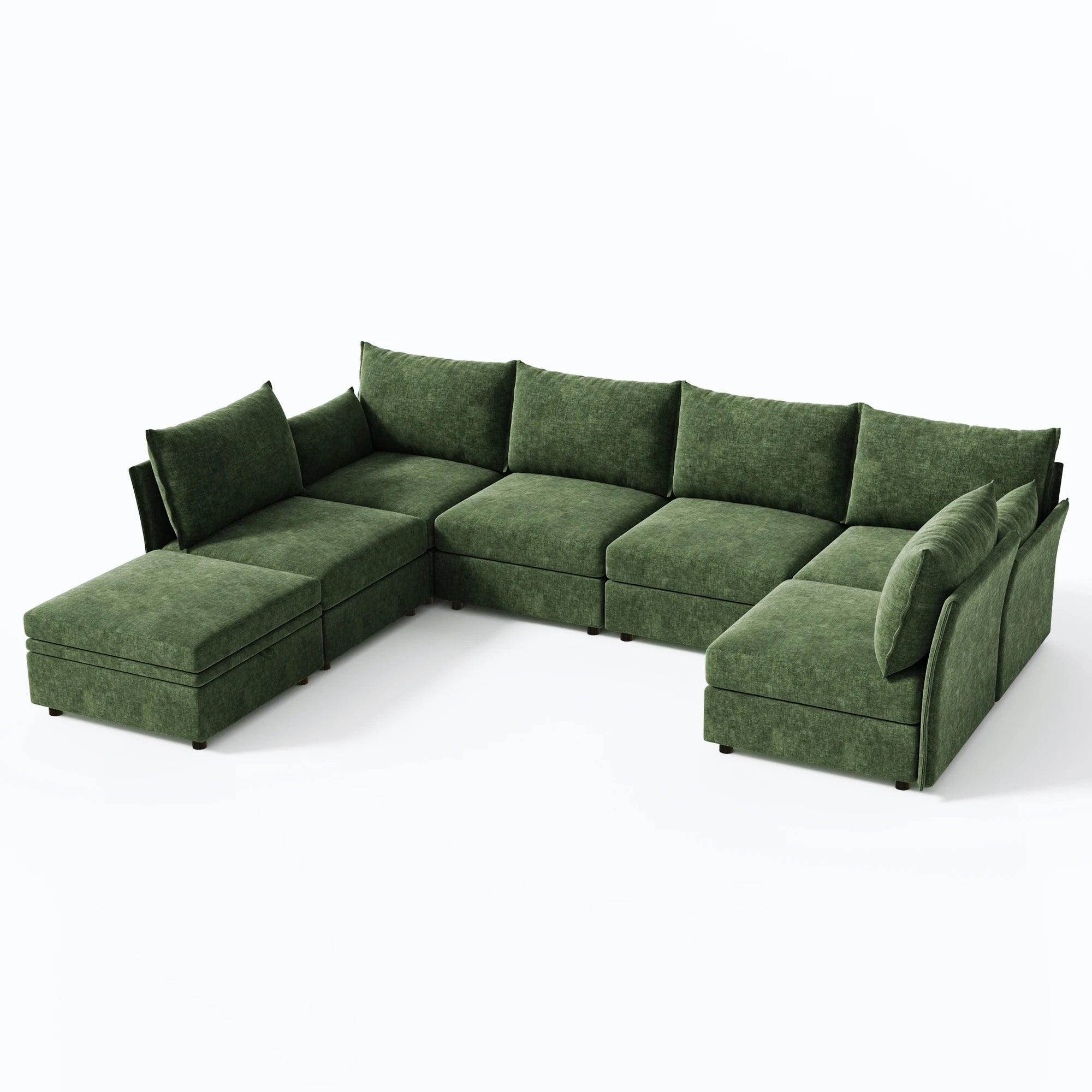 Elevated high-angle perspective of the 7-piece green Huddle sofa highlighting the modular depth and ottoman placement.
