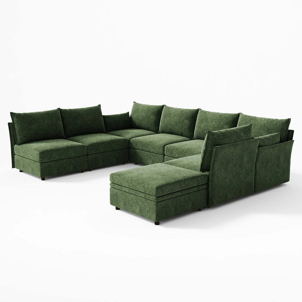 Diagonal corner view of the green 8-piece Huddle sectional highlighting the dual-front extensions.