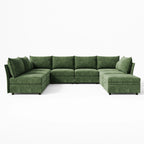 Full front-facing view of the 8-piece Huddle green pit sofa, showing the symmetrical depth and ottoman.