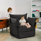 Two children in a room with ABCASA Huddle Black Accent Chair and a desk.