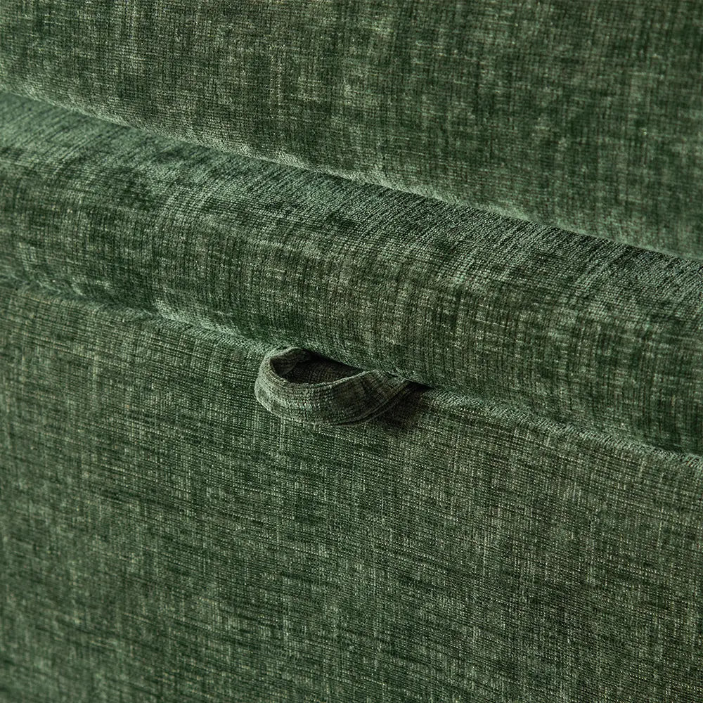 Close-up of green fabric of Huddle hunter green ottoman.
