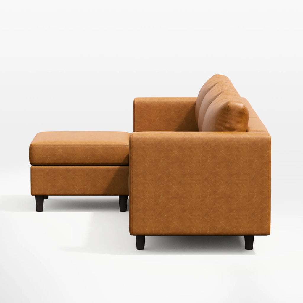Side view of the ABCASA Moro 4-piece modular sofa in saddle tan highlighting clean lines and low-profile arms