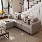 Gray sectional sofa in a living room with decorative pillows and a coffee table.