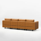 Back view of the ABCASA Moro 4-piece modular sofa in saddle tan showing rear panel design and modular alignment