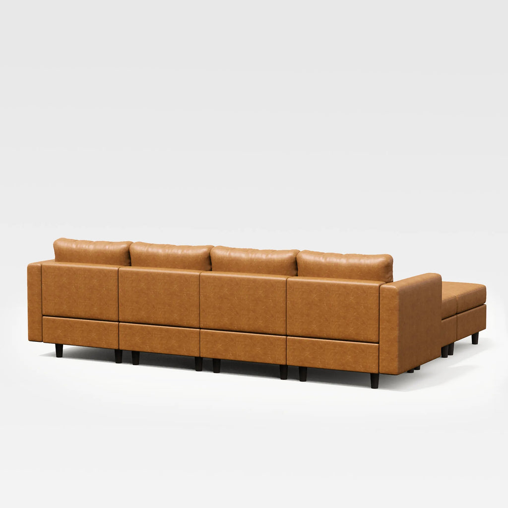 Back view of the ABCASA Moro 7-piece modular sofa in saddle tan showing extended rear profile and sectional scale
