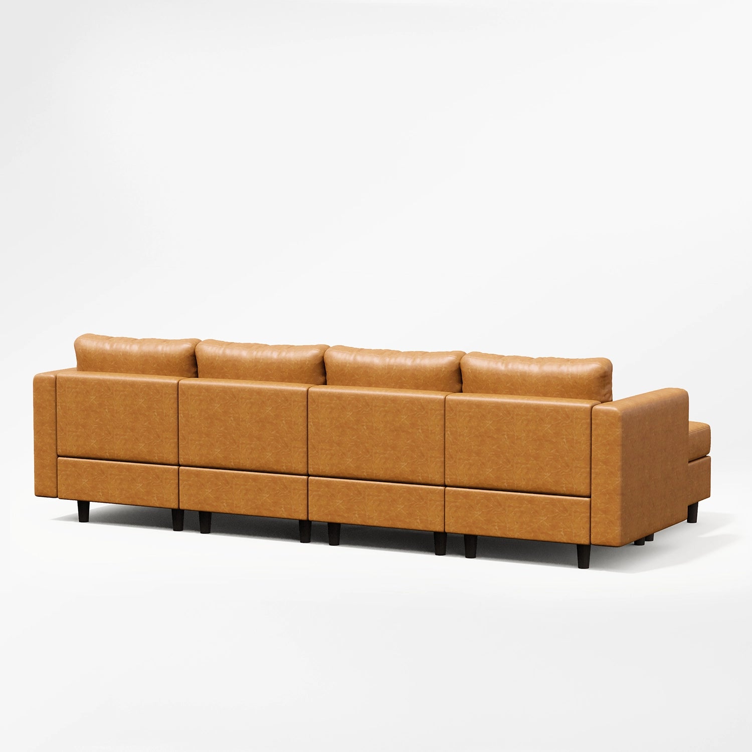The finished back view of the ABCASA Moro modular sofa in saddle tan.