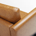 Close-up showing the armrest and thick back cushion construction of the Moro sofa.