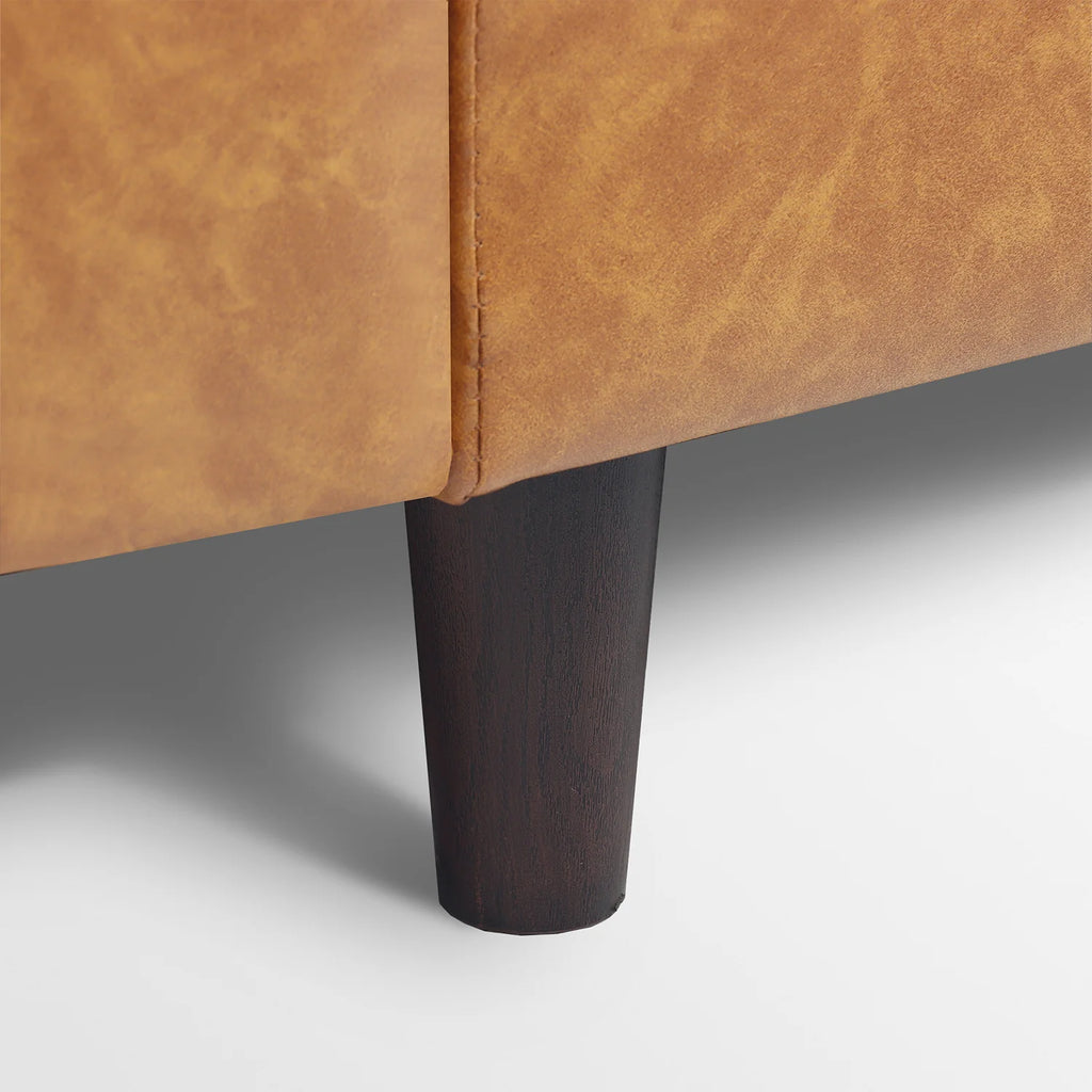 Close-up of the sturdy modern support legs on the ABCASA Moro sofa.