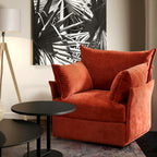 ABCASA Huddle armchair in a modern living room with a black and white abstract painting on the wall.