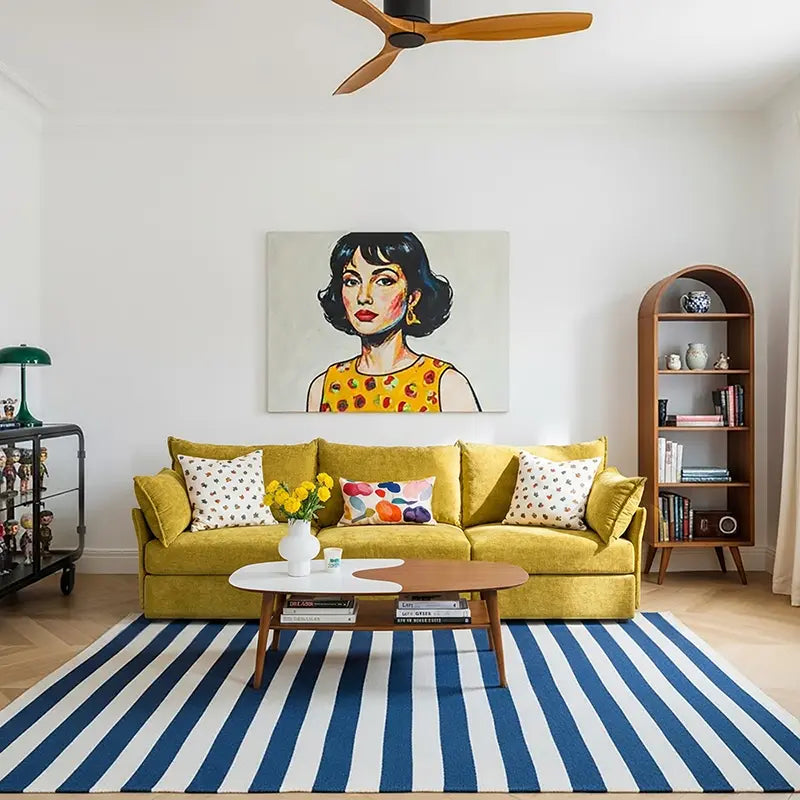 Modern living room featuring the ABCASA Huddle yellow sectional with female-style contemporary decor.