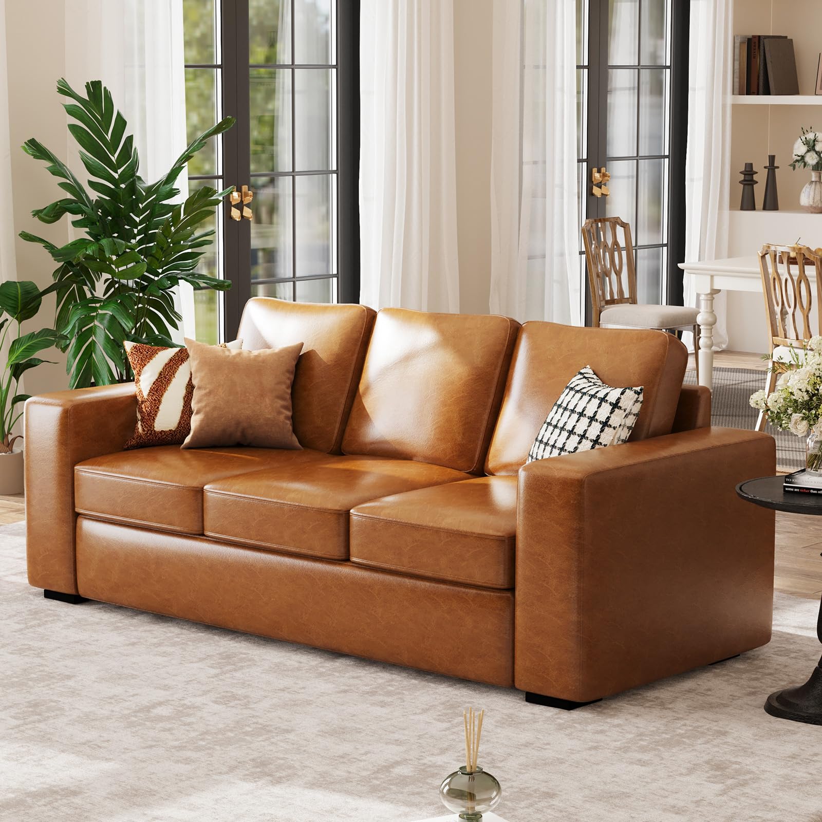 Scandi-minimalist living room featuring the Alba 3-cushion saddle tan leather sofa.