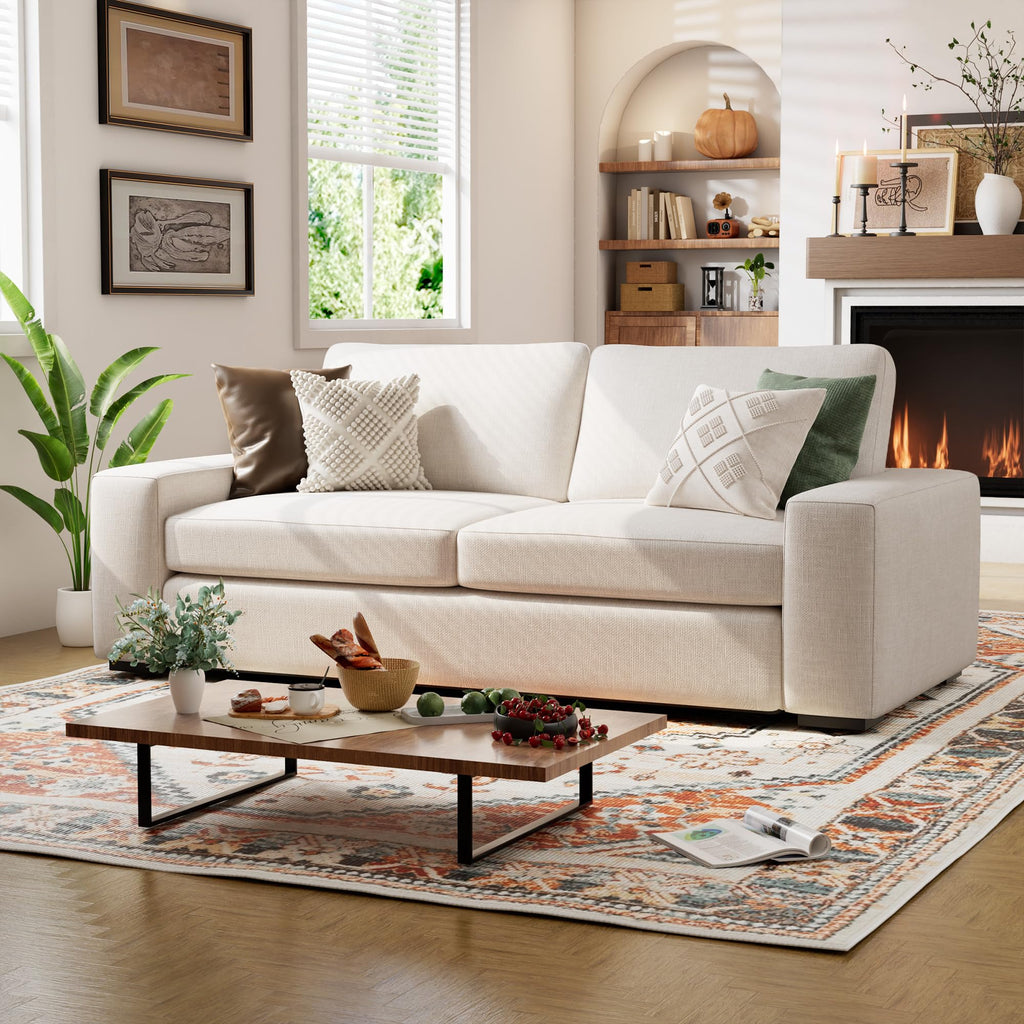 Elegant traditional living room setting with an Alba ivory cream sofa and classic decor.