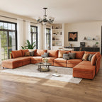 ABCASA terracotta Huddle U-shaped sectional sofa in a living room with wooden floor and large windows.